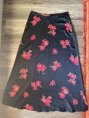 The Limited Black A-Line Skirt with Red Floral Pattern